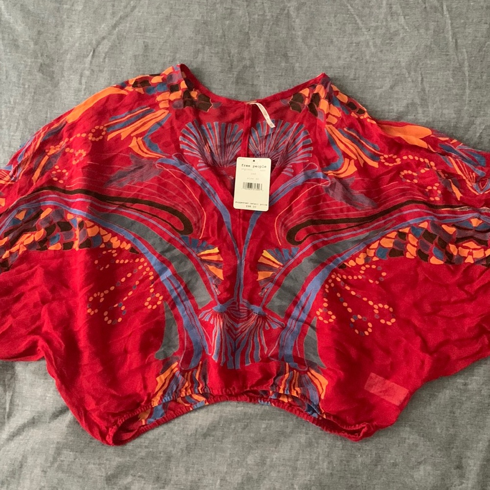 Beautiful, never been worn, free people blouse. New w/tags.